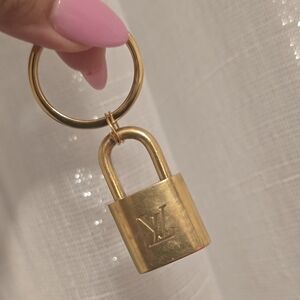Louis Vuitton Lock on 18k gold plated keychain